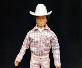 Michael Jackson doll dressed as cowboy